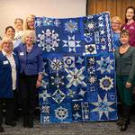 Marcia Haas, campus women honored at event